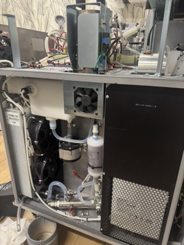 Internal components of a laser system opened for inspection