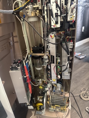 Internal electronics and optics of a medical laser under repair
